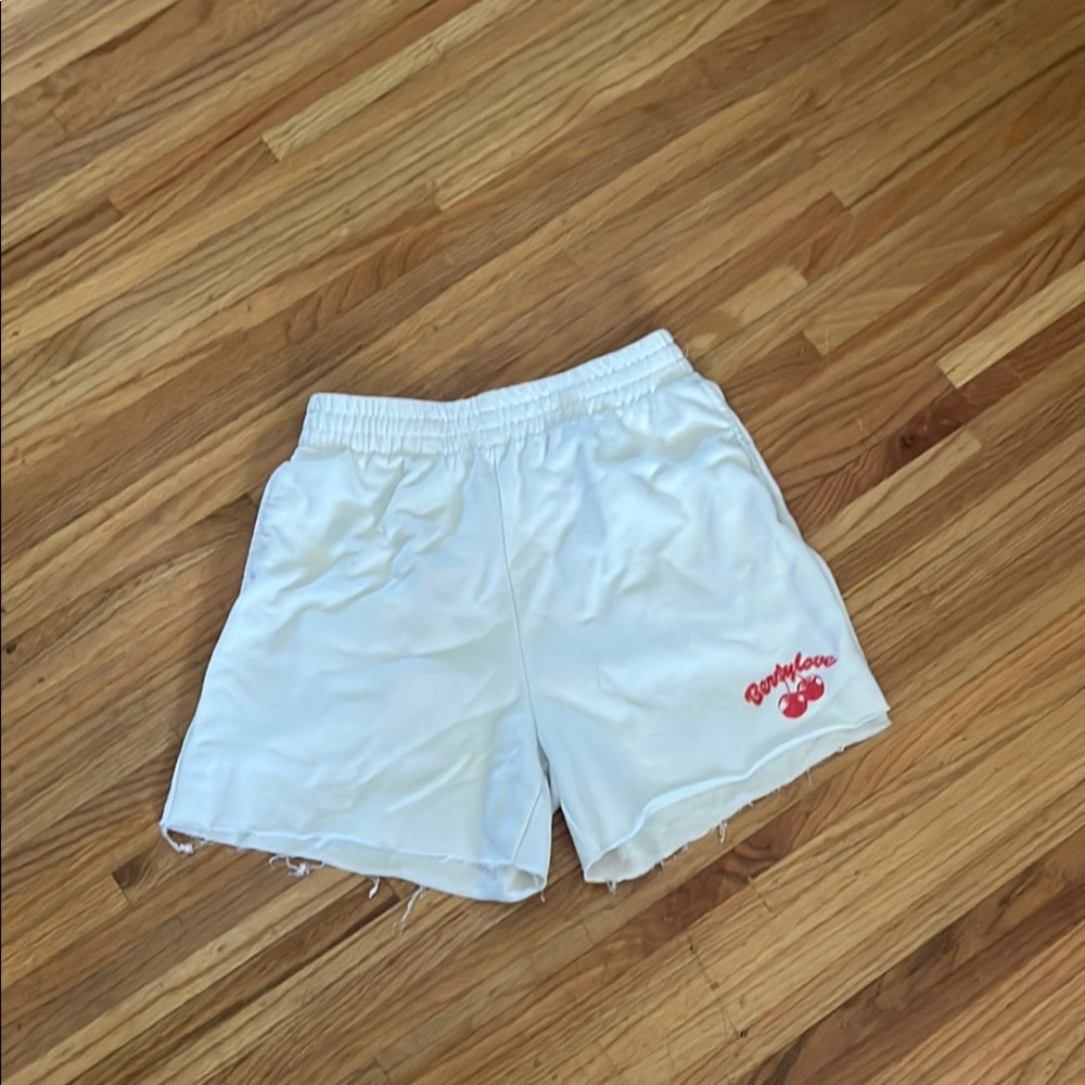 Divided White Athletic Shorts with Elastic Waistband and Red Logo